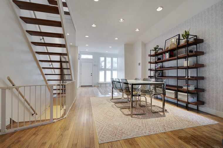 Just inside the front door is a wide open, bright, light space with room for a full dining table or other living space.