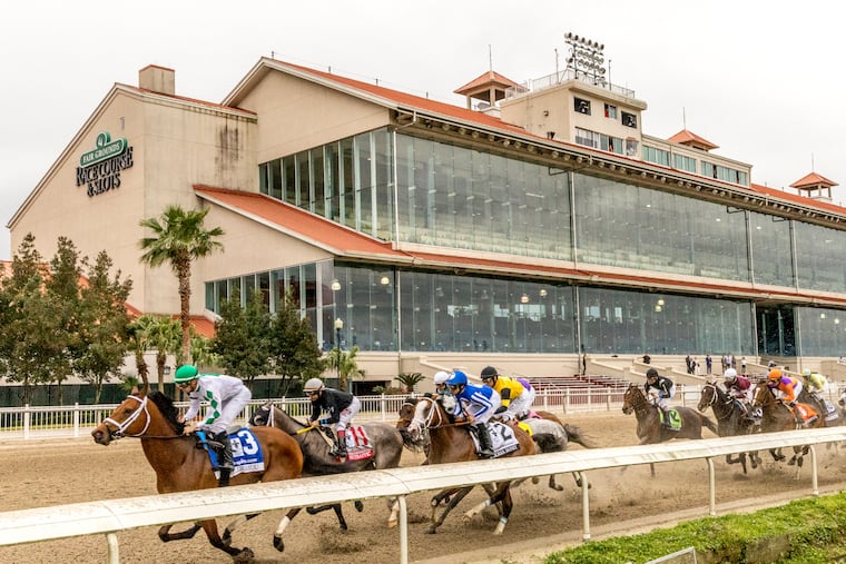 Wells Bayou (left), ridden by jockey Florent Geroux, took an early lead and held off NY Traffic to win he 107th running of the $1,000,000 Grade II Louisiana Derby on March 21, 2020.