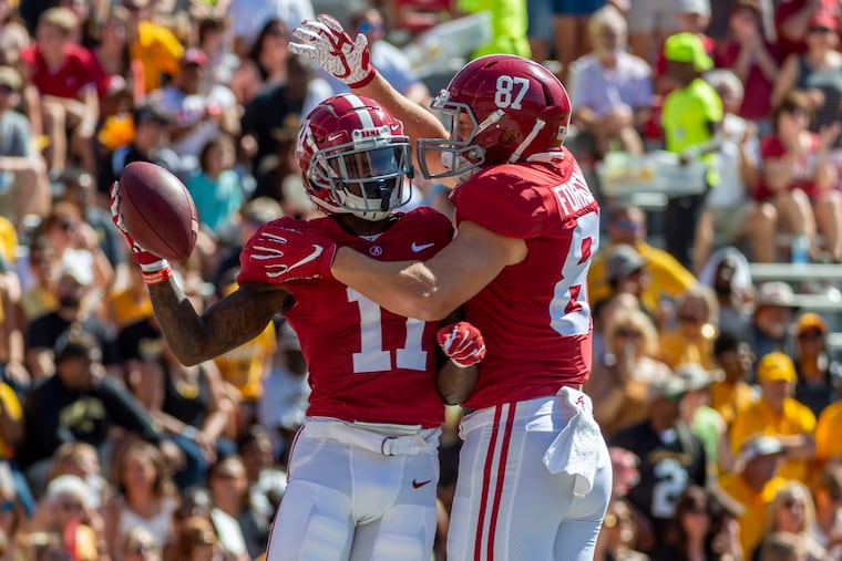 Alabama's Henry Ruggs (11) is one of the prospects making up a deep draft class at wide receiver, and would automatically be an upgrade to what the Eagles had at the position last year.
celebrates his touchdown against Southern Miss with Alabama tight end Miller Forristall (87) during the first half of an NCAA college football game, Saturday, Sept. 21, 2019, in Tuscaloosa, Ala. (AP Photo/Vasha Hunt)