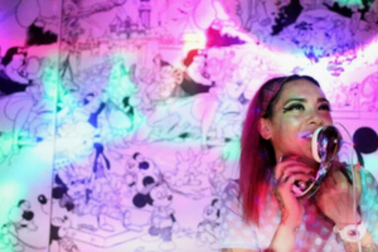 Regina "Gun$ Garcia" Dyhouse thanks fans after wrapping up her final "Man Crush Monday" set at The Barbary.