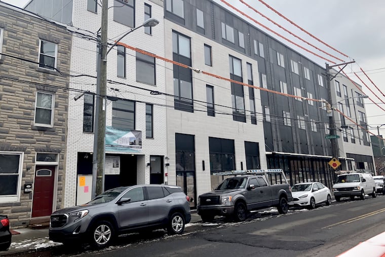 The future Pom Pom, 1425 Frankford Ave., is marked by an orange zoning sign posted by the city.