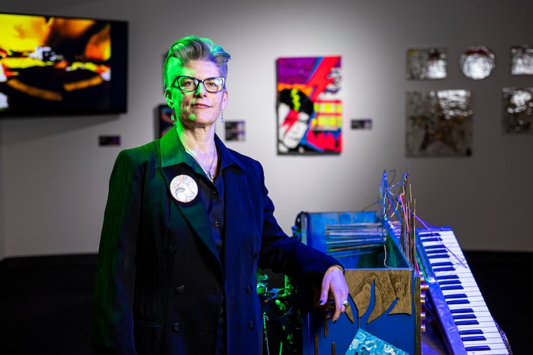 Meegan Coll, curator of artistic partnerships, in the David Bowie Pop-up Gallery at the National Liberty Museum in Philadelphia on Jan. 11, 2023.