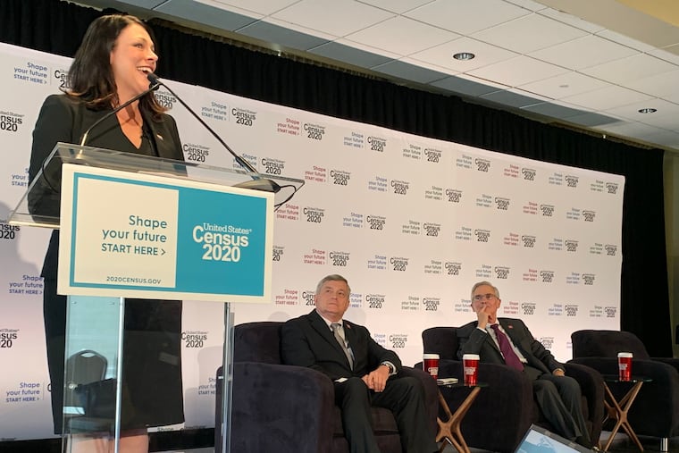 Stephanie Reid, executive director of Philly Counts 2020, speaks at the Independence Visitor Center about her office's plan to train thousands of residents to be "Census Champions" as Census Bureau Director Steven Dillingham and Fernando Armstrong, director of the Philadelphia Regional Office, look on.
