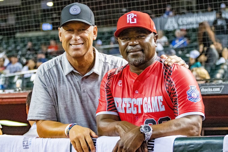 Former Phillies reliever Tom Gordon (right) and former Arizona Diamondbacks star Luiz Gonzalez. Gordon is wearing his World Series ring from the Phillies' 2008 championship team.
