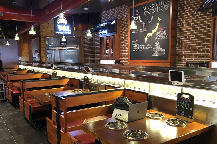 Refrigerator conveyor belt at Chubby Cattle, opening soon at 146 N. 10th St.