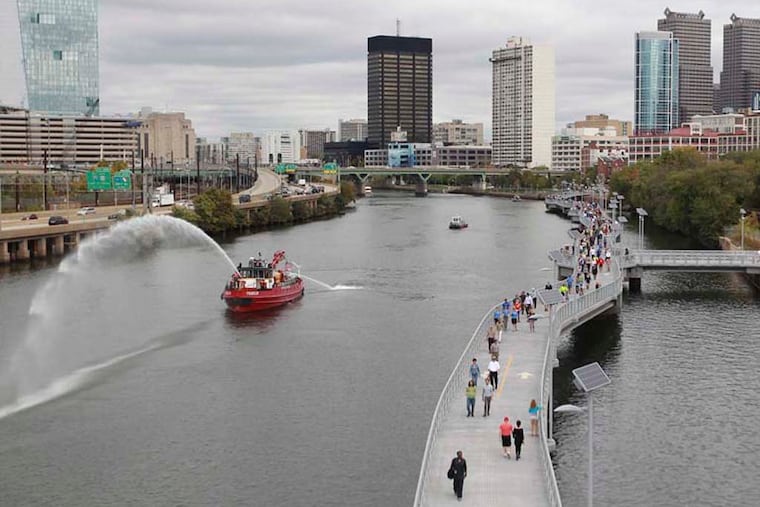 The Schuylkill Banks boardwalk extends the river trail from Locust Street to the South Street Bridge. 10/02/2014 ( MICHAEL BRYANT / Staff Photographer )