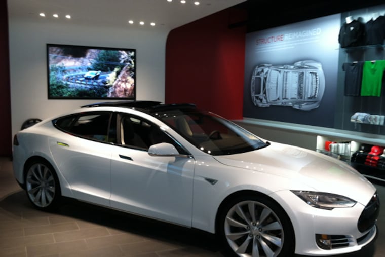 One of the two Tesla Model S sedans on display in the showroom at the Plaza of King of Prussia, which opened Friday, May 17, 2013.