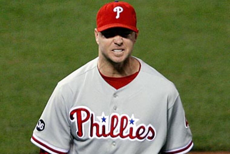 Ryan Madson and the rest of the bullpen pitched three scoreless innings in Game 5. (David Maialetti / Staff Photographer)