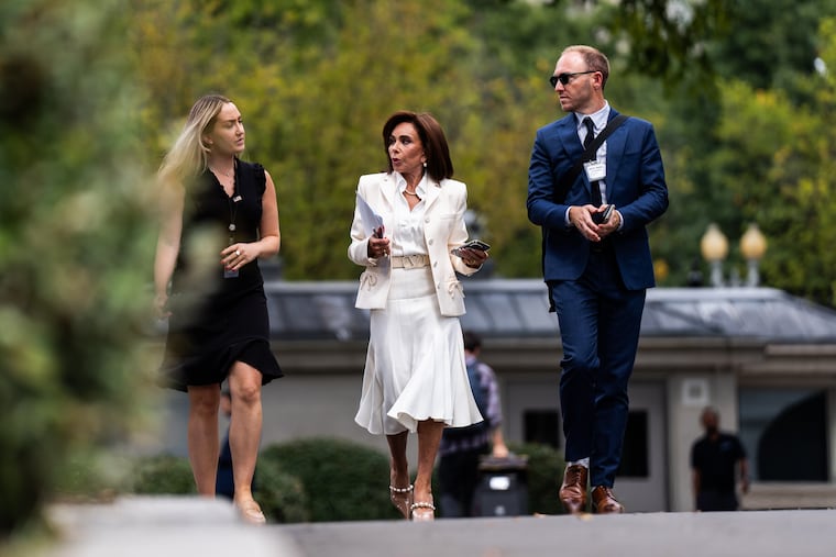 Jeanine Pirro (center) the U.S. attorney for the District of Columbia, outside the West Wing last year.