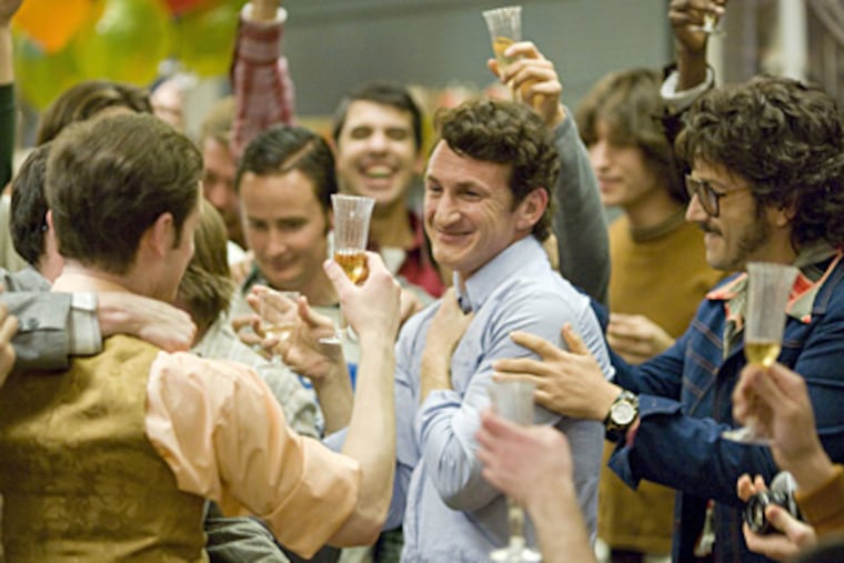 Sean Penn (center) and Diego Luna (right) star as real-life gay rights icon Harvey Milk and his lover Jack Lira, respectively, in director Gus Van Sant's "MILK." (Photo by Phil Bray)