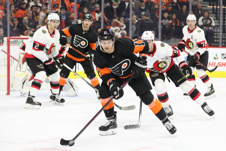 Flyers right wing Travis Konecny skates with the puck against the Ottawa Senators on Saturday, December 18, 2021 in Philadelphia.