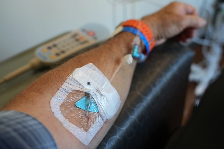 Medication is administered to a patient intravenously during cancer treatment in Provo, Utah. The prolonged closure of the Strait of Hormuz could lead to shortages of lifesaving drugs.