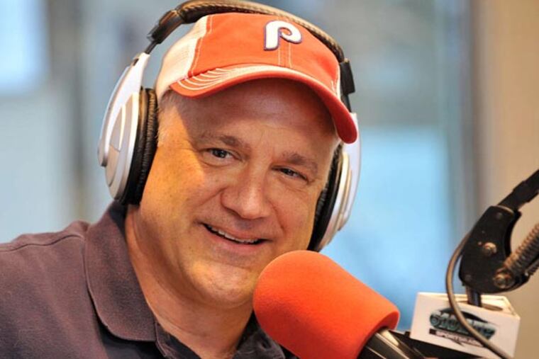 Glen Macnow, of WIP Sportsradio, samples an Italian hoagie at the studio in Bala Cynwyd, in his quest to name the best in the city and talks about on the air in his Bala Cynwyd studio. (Sharon Gekoski-Kimmel / Staff Photographer) June 2, 2009. Editors Note: FD1MACNOW11 9/9