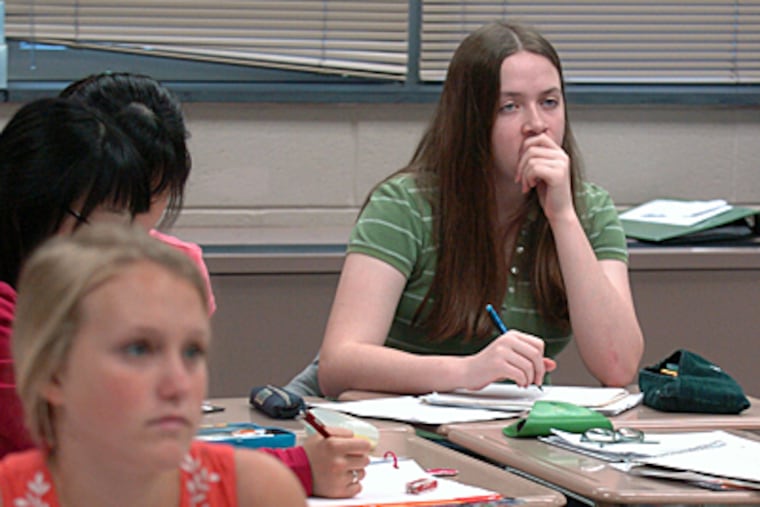 Annie Iodice splits her days between Radnor High and Cabrini College. "If I can do college work right now, why not do it?' said Iodice, a ninth grader. (CLEM MURRAY / Inquirer Staff Photographer)