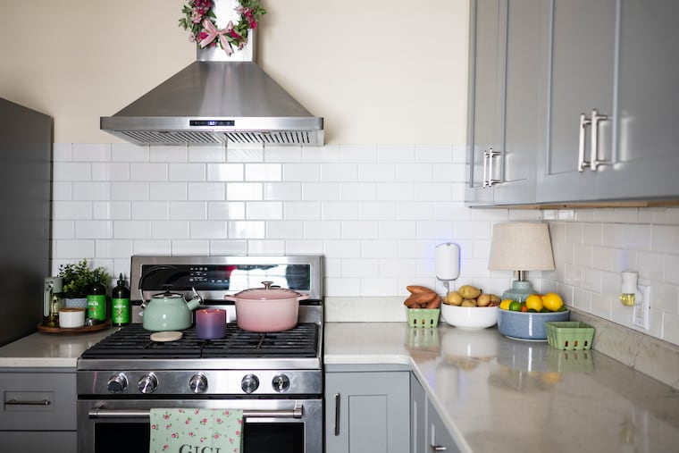 The kitchen features stainless steel appliances.