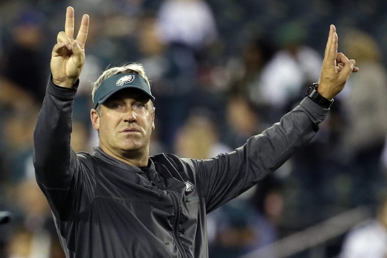 Philadelphia Eagles head coach Doug Pederson gestures as players work out prior to an NFL football game against the Washington Redskins, Monday, Oct. 23, 2017, in Philadelphia. (AP Photo/Michael Perez).