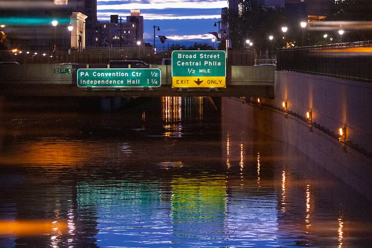 The Vine Street Expressway was covered with water due to heavy rain from Hurricane Ida.
