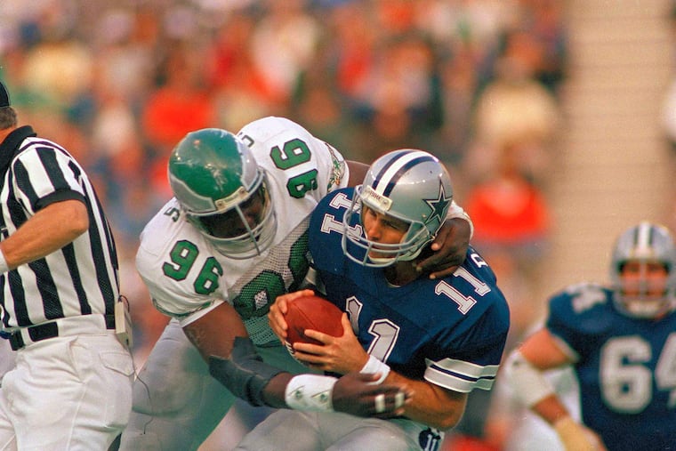 Former Eagles defensive end Clyde Simmons, shown sacking the Cowboys' Danny White, is especially impressed by Jalen Carter.