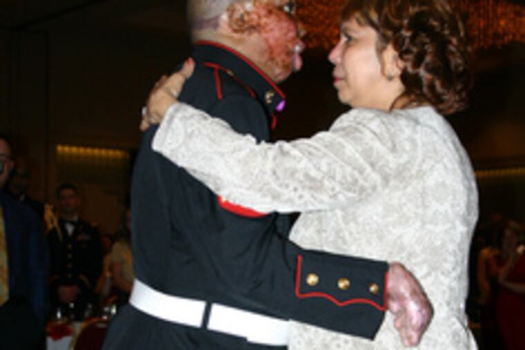 Surprising his mother, Lourdes, German takes her for a spin on the dance floor at the hospital's 2006 Holiday Ball. He had practiced for months.