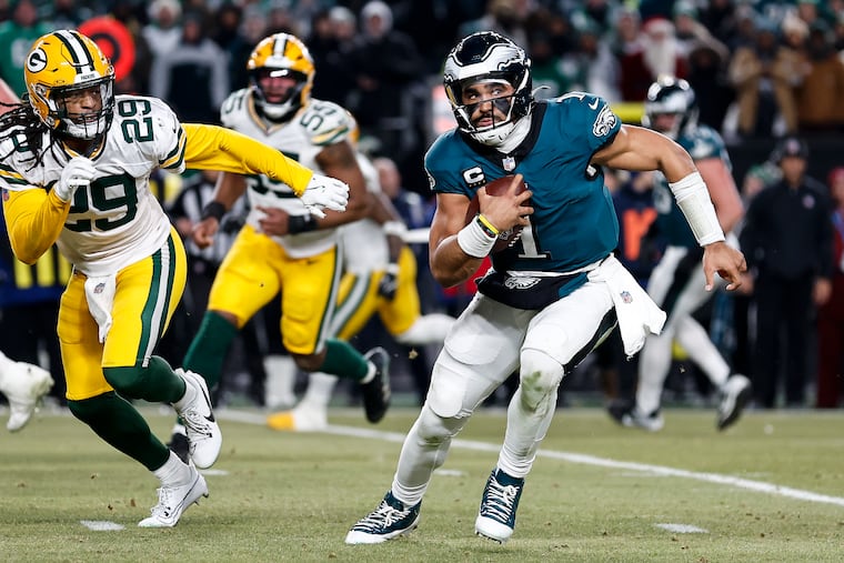 Eagles quarterback Jalen Hurts runs during the wild-card playoff game against the Green Bay Packers on Jan. 10.