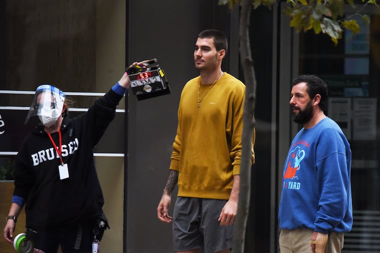 Juancho Hernangómez and Adam Sandler film the Netflix movie 'Hustle' in Philadelphia on Tuesday.