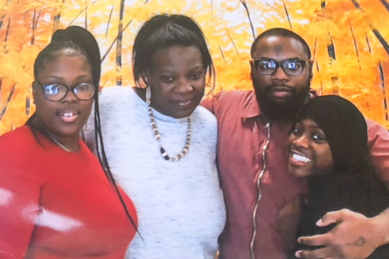 Curtis Kingwood with his daughter Kalimah, right, and his cousin, left, and sister, second from left.