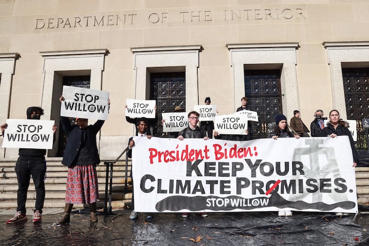 Climate activists hold a demonstration to urge President Joe Biden to reject the Willow Project at the US Department of Interior on Nov. 17, 2022, in Washington, D.C.