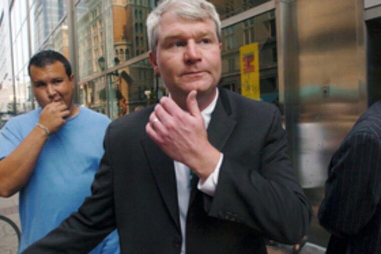 John Dougherty, leaving RDA board meeting yesterday.