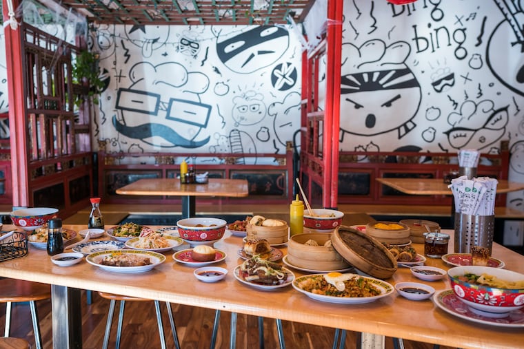 A mural covers the walls of the interior dining space at Bing Bing Dim Sum on East Passyunk Avenue, shown in 2021.