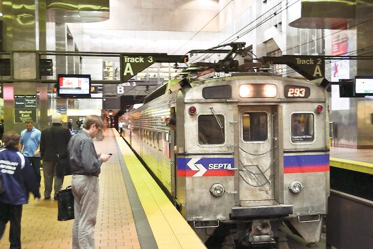 SEPTA patrons wait to board one of the regional lines at the Market East station on Friday, June 13, 2014. C.F. Sanchez / Staff Photographer