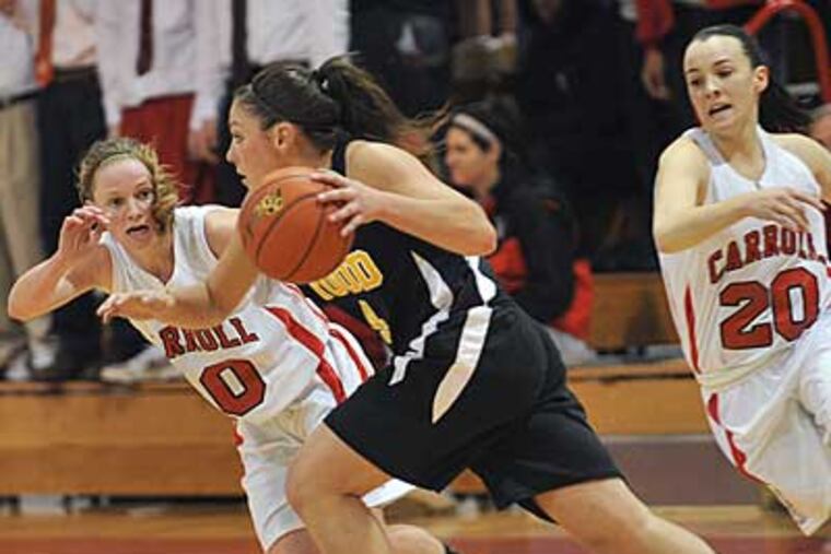 Carroll's Erin Shields (left) guards Wood's Sam Greenfield with Carroll's Meghan Creighton. ( Sharon Gekoski-Kimmel / Staff Photographer )