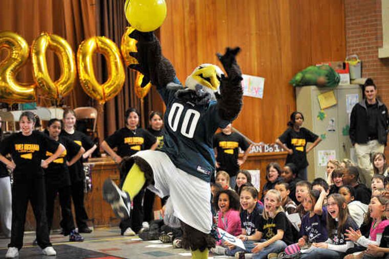 Swoop, the Eagles' mascot, helps rally students at James Buchanan Elementary Schoolin Levittown before this week's Pennsylvania System of School Assessment exams.