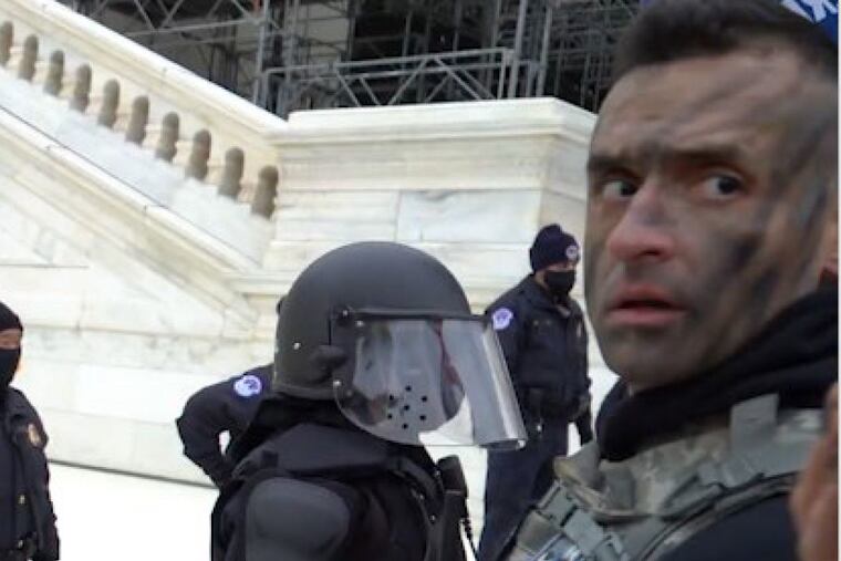 In this image from court filings, Samuel Lazar, of Ephrata, is pictured outside the Capitol in Washington on Jan. 6, 2021.