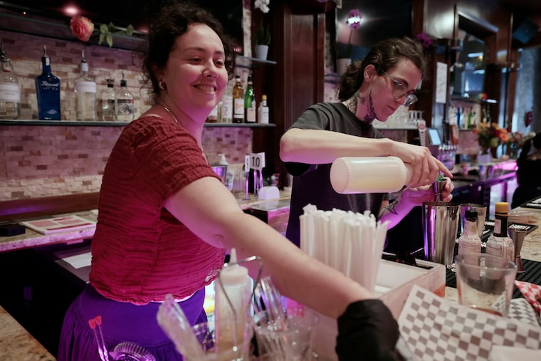Val’s Lesbian Bar co-owners Julia Harris (left) and Clover Gilfor working hard during the grand opening of their Val’s Lesbian Bar, 605 South 3rd Street in Philadelphia on Wednesday, March 18, 2026
