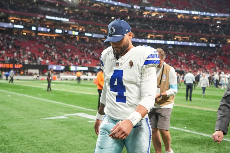 Dallas Cowboys quarterback Dak Prescott (4) walks off the field after losing to the Atlanta Falcons on Sunday.