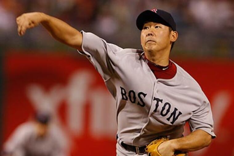 Daisuke Matsuzaka took a no-hitter into the eighth inning. (Ron Cortes / Staff Photographer)