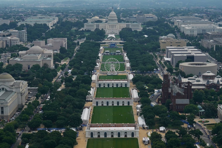 The Freedom 250 Ferris wheel and the U.S. Capitol are seen on the National Mall from the Washington Monument during the Great American State Fair on Friday.