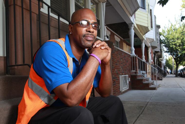 Anthony Reynolds cleans planes overnights at PHL, specifically MEC, major effort cleaning. (MICHAEL BRYANT/Staff Photographer)