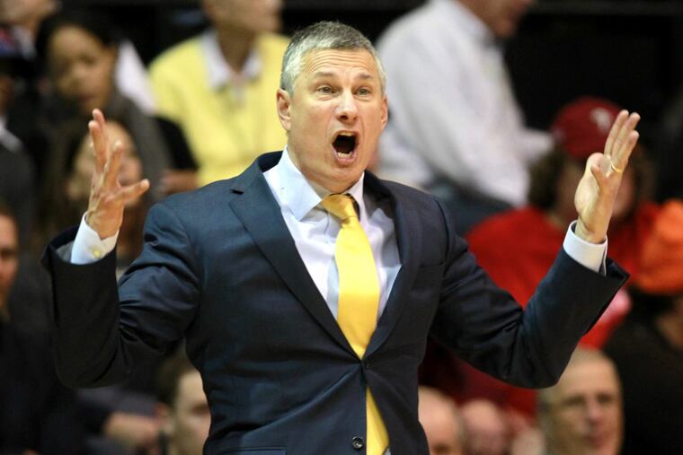 La Salle coach John Giannini watches as his team plays against St. Joseph’s in January.