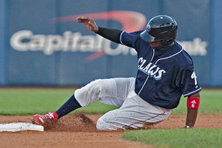 Ryan Howard slides safely into second in the first inning of his rehab start with Single-A Lakewood. (David M Warren/Staff Photographer)