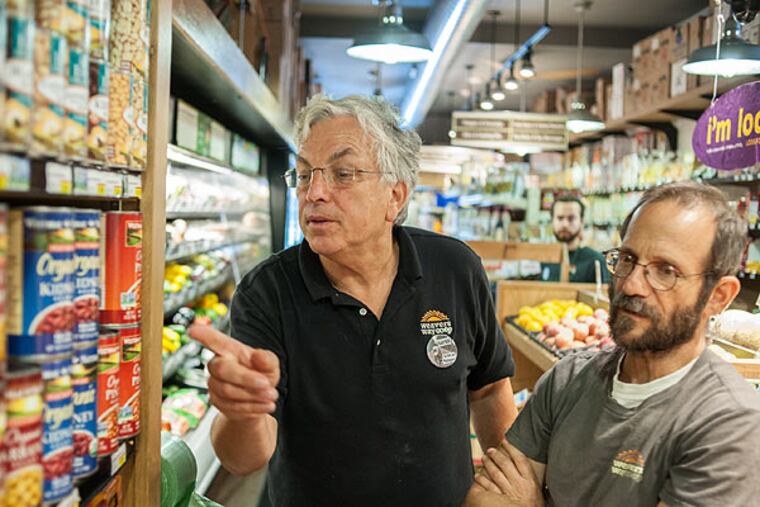 Weaver's Way Co-Op General Manager Glenn Bergman (left) and Purchasing Manager Norman Weiss say theur Mt. Airy food co-op is debating a boycott of Eden Foods because of their stance on the Affordable Care Act. (Matthew Hall / Staff Photographer)
