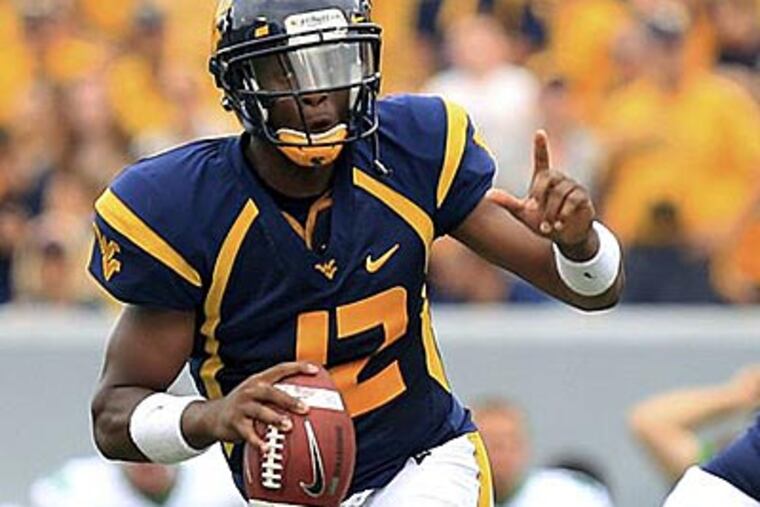 West Virginia quarterback Geno Smith is an early Heisman favorite. (Christopher Jackson/AP file photo)
