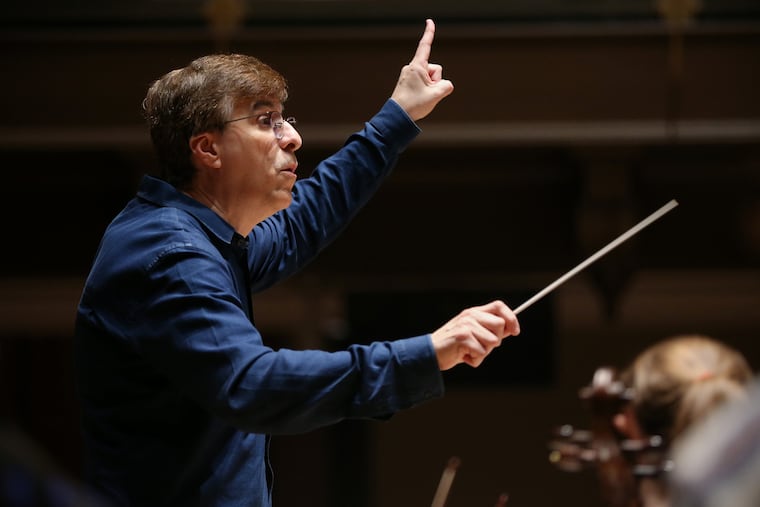 Composer Vince Mendoza leads a rehearsal of his composition "Constant Renaissance," commissioned by Temple University's Boyer College of Music and Dance, with the Temple Studio Orchestra at the school's performing arts center in North Philadelphia on Tuesday, March 19, 2019. The piece features soloists Terell Stafford on trumpet and Dick Oatts on alto saxophone — both jazz professors at the college — and will premiere Sunday at the Kimmel Center.
