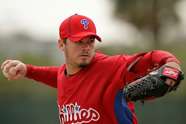 Phillies' pitcher Chad Durbin throws the baseball during spring
training workouts. (Yong Kim / Staff Photographer)