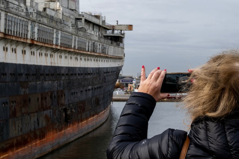 The SS United States in South Philadelphia Thursday, Nov. 14, 2014 as the ship's conservancy hosts an excursion cruise on the day the ocean liner was first scheduled to begin its move to Alabama.