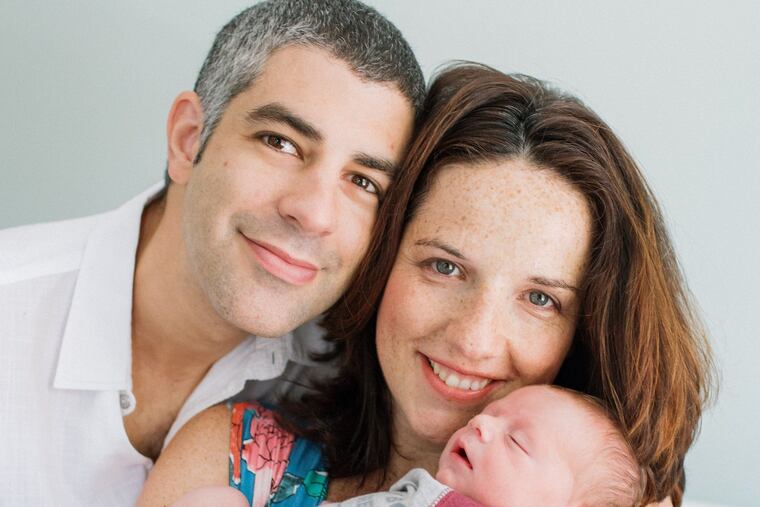 Bradley and Jeanna Cooper with infant Nolan.