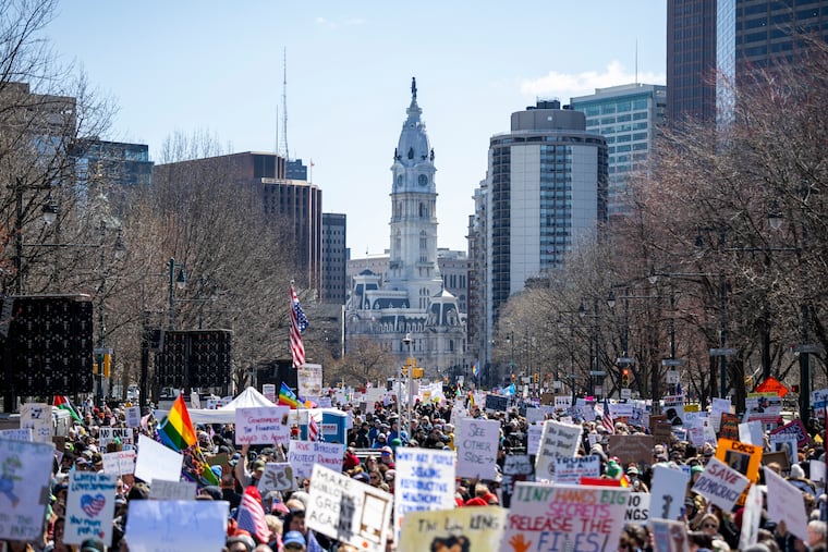 Protesters take to the streets on the Benjamin Franklin Parkway at the third “No Kings” Rally in Center City on Saturday.