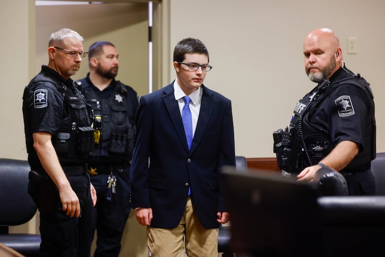 Colt Gray, the 16-year-old Apalachee High School shooting suspect, is led in by deputies for a plea hearing at Barrow County Superior Court in Winder, Ga., on Friday, July 24, 2026.