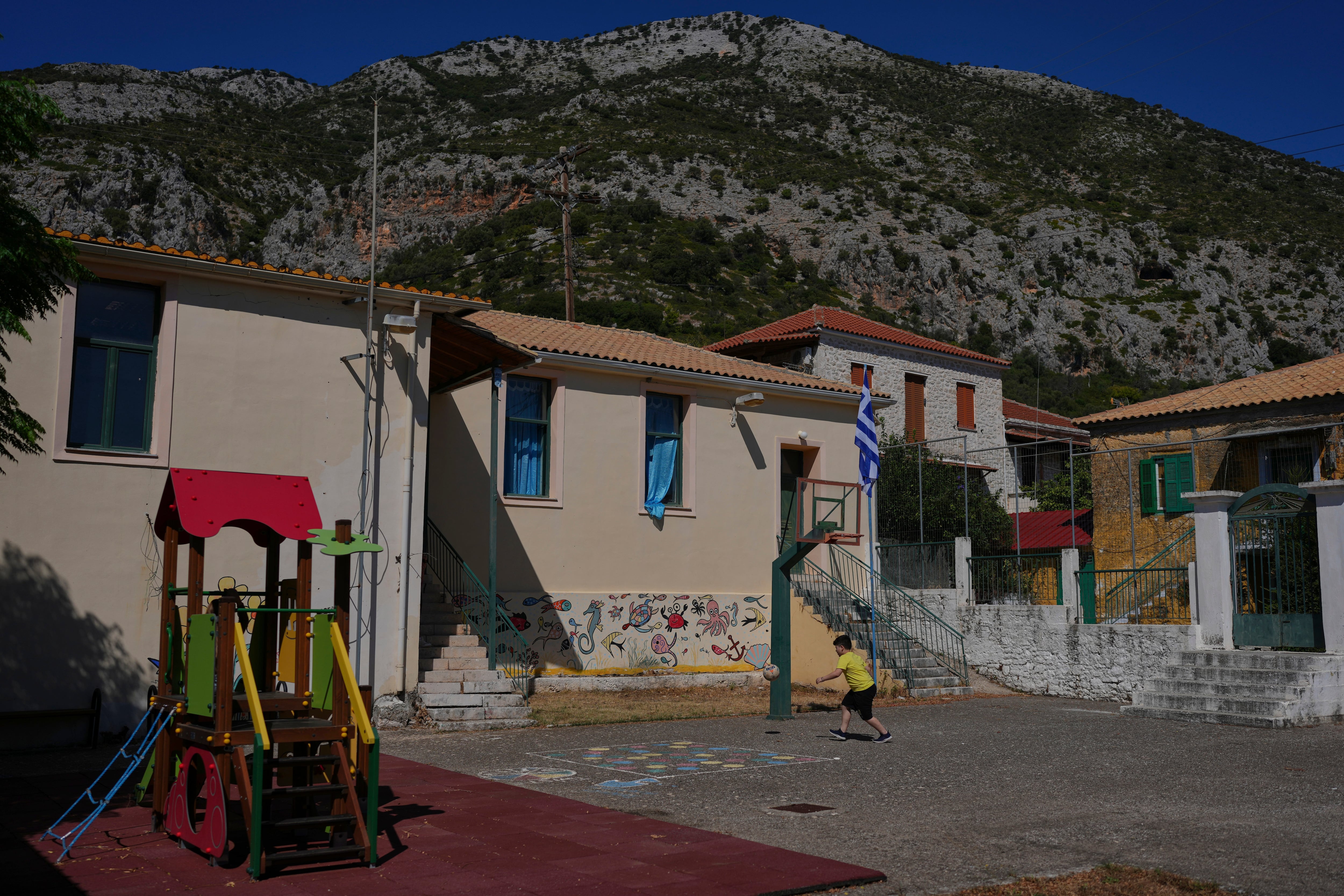 Greek island kids have to catch a boat to school as Europe ages, in photos