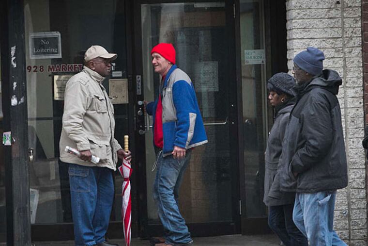 Passersby in front of Addiction Medicine at 928 Market St. The clinic has a five-year lease. (Alejandro A. Alvarez / Staff Photographer)